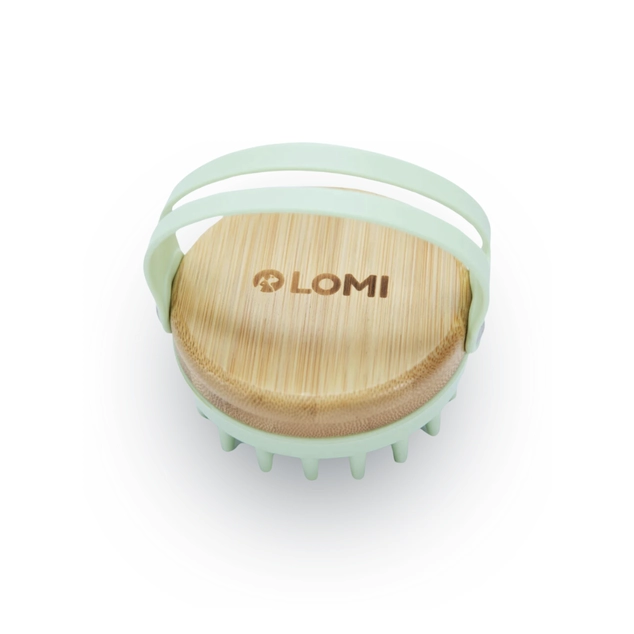 une belle brosse pour masser et laver votre animal