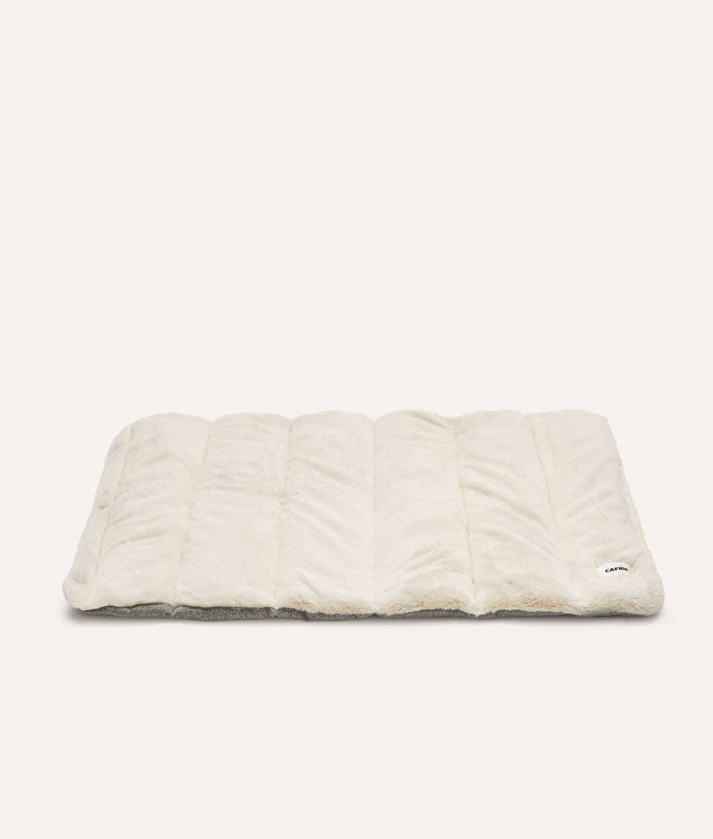 un lit pour chien pour le voyage